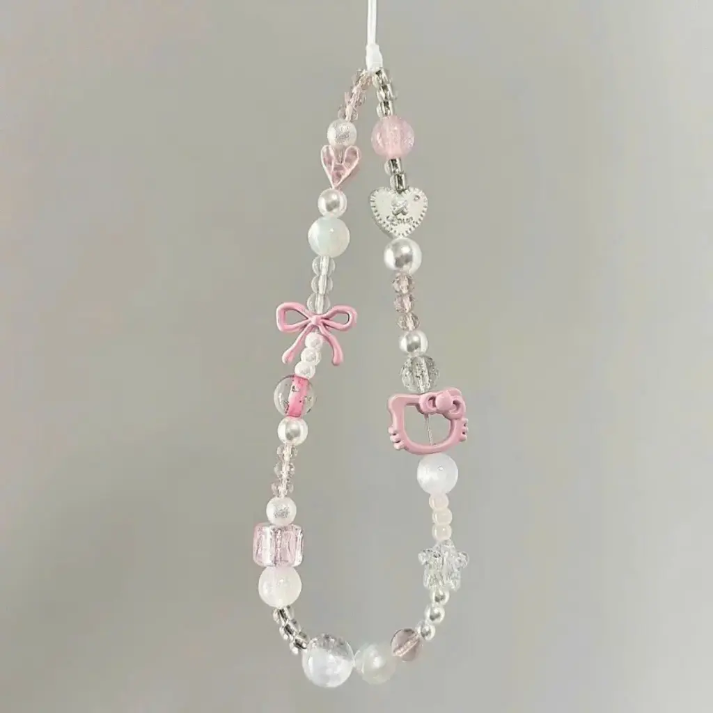 Dây đeo điện thoại hello kitty cườm màu hồng